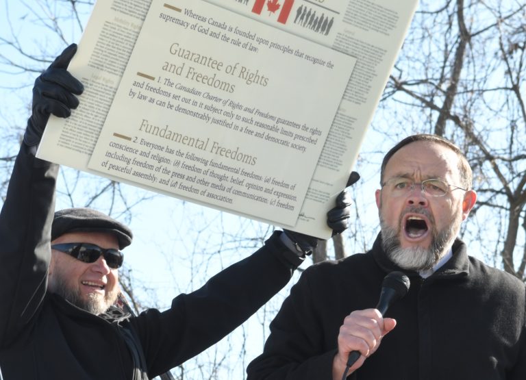 Church of God pastor ticketed for protest